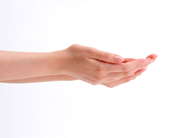 A pair of open hands isolated on a white background.