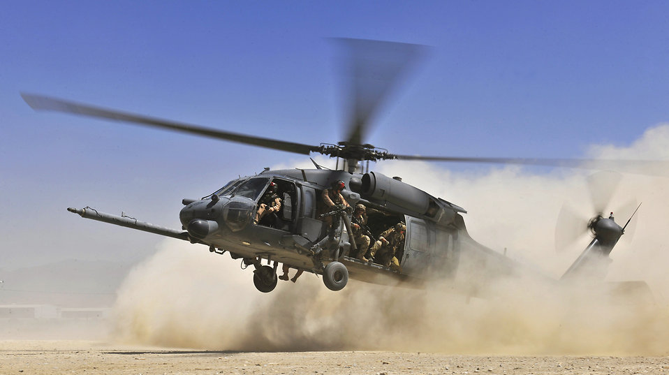An HH-60G Pave Hawk helicopter carrying combat search and rescue Airmen approaches a landing zone during an exercise at Bagram Airfield, Afghanistan, Aug. 21. 2010. The exercise tested the rescue squadron's ability to provide medical aid to U.S. and coalition forces.
