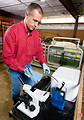 Free Stock Photo: An animal researcher using a water bath