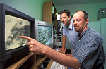 Free Stock Photo: Two researchers looking at data on a computer screen