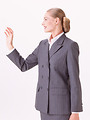 Free Stock Photo: A beautiful blonde businesswoman in a suit isolated on a white background