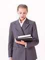 Free Stock Photo: A beautiful blonde businesswoman in a suit isolated on a white background