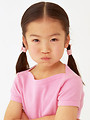 Free Stock Photo: A cute pouting Asian girl isolated on a white background