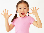Free Stock Photo: A cute Asian girl with a surprised expression isolated on a white background