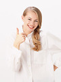 Free Stock Photo: A beautiful blonde giving a thumbs up isolated on a white background