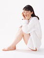 Free Stock Photo: A beautiful woman sitting isolated on a white background