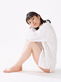 Free Stock Photo: A beautiful woman sitting down isolated on a white background