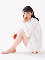 Free Stock Photo: A beautiful woman sitting down isolated on a white background