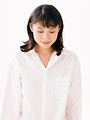 Free Stock Photo: A beautiful woman with closed eyes isolated on a white background