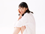 Free Stock Photo: A beautiful woman sitting down isolated on a white background