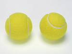 Free Stock Photo: A pair of tennis balls isolated on a white background