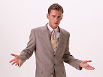 Free Stock Photo: A young business man in a suit isolated on a white background