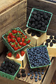 Free Stock Photo: Baskets of strawberries, blueberries and blackberries