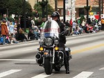 Free Stock Photo: A police officer on a motorycle in the 2010 Saint Patricks Day Parade in Atlanta, Georgia