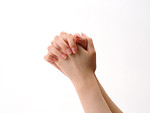 Free Stock Photo: A pair of hands praying isolated on a white background
