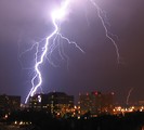 Free Stock Photo: Lightning striking over a city