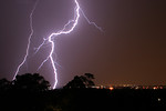 Free Stock Photo: Lightning striking over a city at night