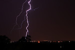 Free Stock Photo: Lightning striking over a city at night