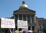 Free Stock Photo: Protestors with signs at the 2010 Atlanta tax day tea party in Atlanta, Georgia