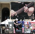 Free Stock Photo: A man playing a guitar at the 2010 Atlanta tax day tea party in Atlanta, Georgia