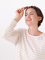 Free Stock Photo: A beautiful brunette with sunglasses isolated on a white background