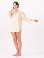 Free Stock Photo: A beautiful brunette in a night shirt isolated on a white background
