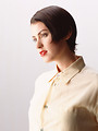 Free Stock Photo: A beautiful brunette in a nightshirt isolated on a white background