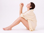 Free Stock Photo: A beautiful brunette in a nightshirt isolated on a white background