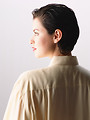 Free Stock Photo: A beautiful brunette in a nightshirt isolated on a white background