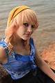 Free Stock Photo: Portrait of a beautiful young woman posing by a lake