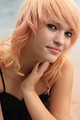 Free Stock Photo: Close-up portrait of a beautiful young woman posing by a lake