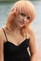Free Stock Photo: Close-up portrait of a beautiful young woman posing by a lake