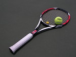 Free Stock Photo: A tennis racquet and tennis ball