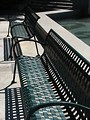 Free Stock Photo: Park benches near a pool