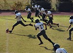 Free Stock Photo: A middle school football team kicking off