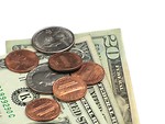 Free Stock Photo: Close-up of some dollars and coins on a white background