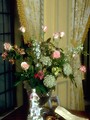 Free Stock Photo: A vase with a bouquet including pink roses