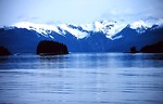 Free Stock Photo: Snow covered mountains by a lake