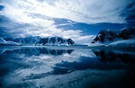 Free Stock Photo: Snow covered mountains by a lake
