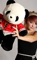 Free Stock Photo: A beautiful young girl holding a stuffed panda bear