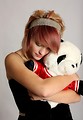 Free Stock Photo: A beautiful young girl holding a stuffed panda bear