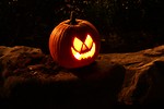 Free Stock Photo: A Halloween jack-o-lantern on a rock