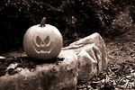 Free Stock Photo: A Halloween jack-o-lantern on a rock