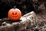 Free Stock Photo: A Halloween jack-o-lantern on a rock