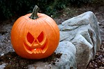 Free Stock Photo: A Halloween jack-o-lantern on a rock