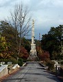 Free Stock Photo: The Confederate Obelisk and flags at historic Oakland Cemetery in Atlanta, Georgia