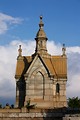 Free Stock Photo: A small mausoleum and tombstones at historic Oakland Cemetery in Atlanta, Georgia