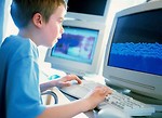 Free Stock Photo: Boy working on a computer