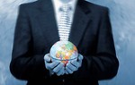 Free Stock Photo: Businessman holding a globe