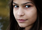 Free Stock Photo: A beautiful young girl posing outdoors